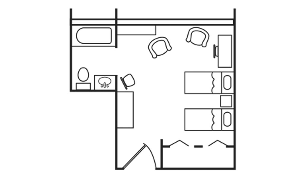 A floor plan of a senior living suite in Canton, Ohio, featuring two beds, a seating area with two chairs and a table, a bathroom with toilet and bathtub, and a closet near the entrance.